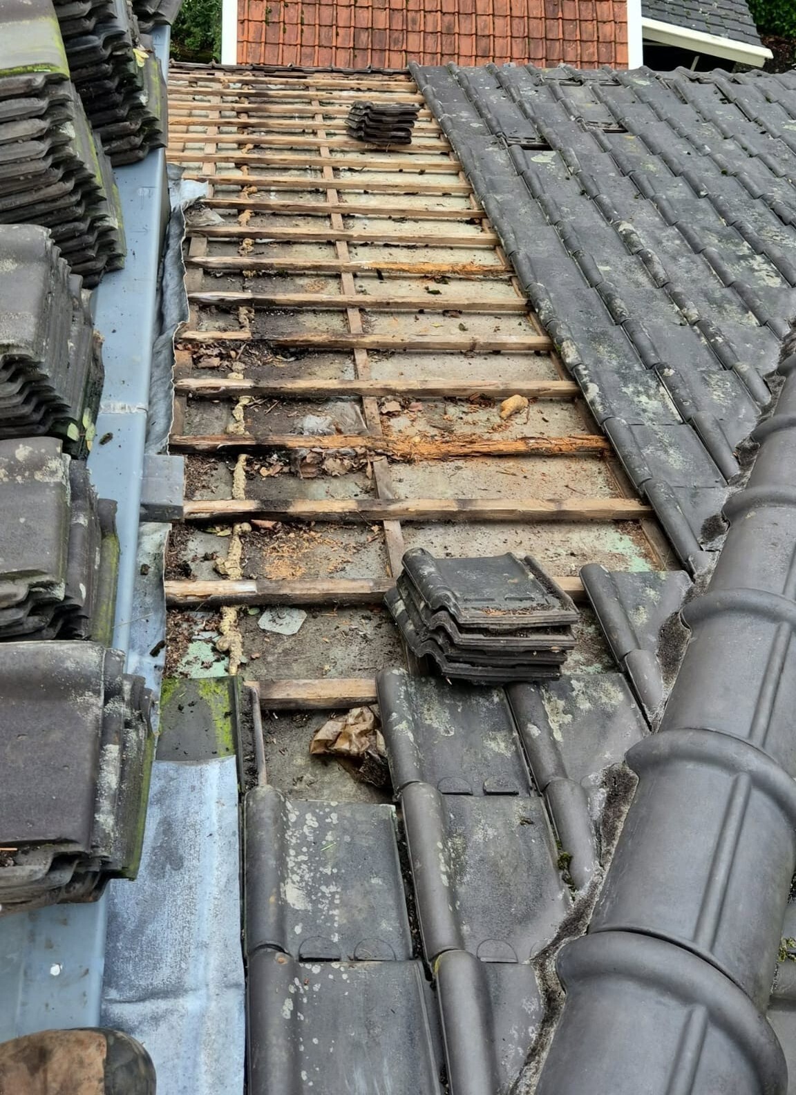 Lekkage bij een dakkapel door oud lood